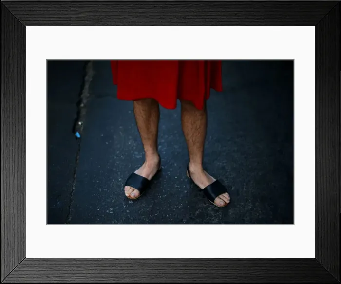 Framed Print : A man wears a dress as he attends a march to mark International Womens Day in Santiago