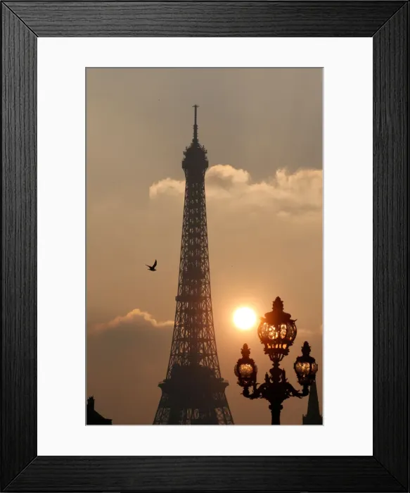 Framed Print : The Eiffel tower is pictured as the sun sets on a winter day in Paris Framed Print : The Eiffel tower is pictured as the sun sets on a winter day in Paris