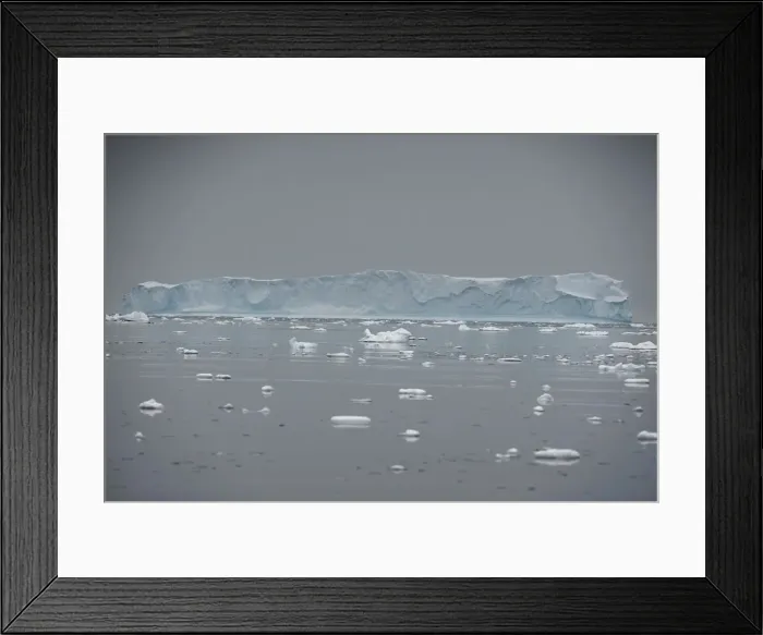 Framed Print : An iceberg floats in Andvord Bay, Antarctica