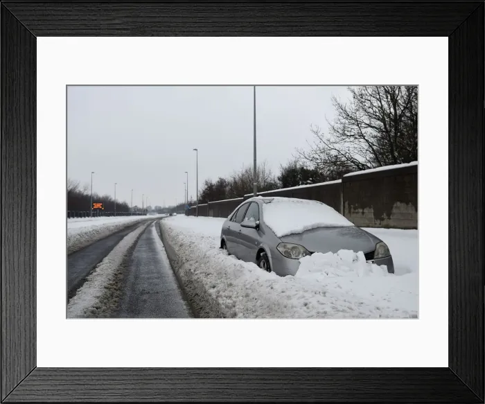 Framed Print : A car is abandoned on a dual carriageway road near Dublin Framed Print : A car is abandoned on a dual carriageway road near Dublin