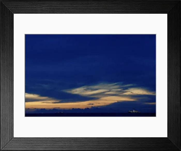 Framed Print : A ship sails toward the Colombo Harbor as the sun sets in Colombo Framed Print : A ship sails toward the Colombo Harbor as the sun sets in Colombo