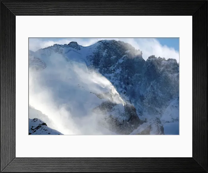 Framed Print : Wind blows snow off the top of a mountain in Saint-Pancrace as winter weather bringing Framed Print : Wind blows snow off the top of a mountain in Saint-Pancrace as winter weather bringing