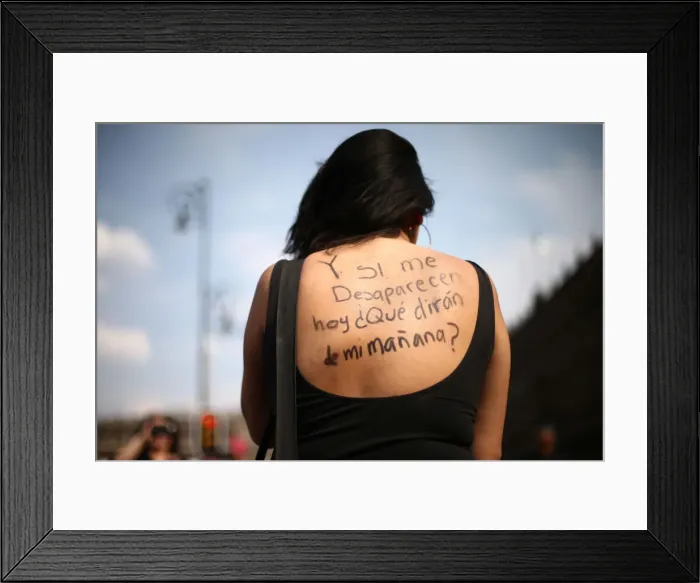 Framed Print : A woman takes part in a demonstration demanding justice for the female victims of Framed Print : A woman takes part in a demonstration demanding justice for the female victims of