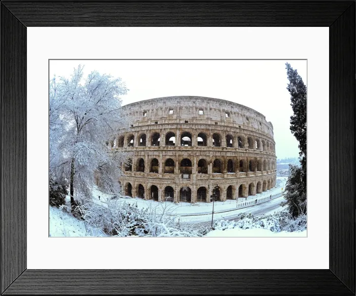 Framed Print : The Colosseum is seen during a heavy snowfall in Rome Framed Print : The Colosseum is seen during a heavy snowfall in Rome
