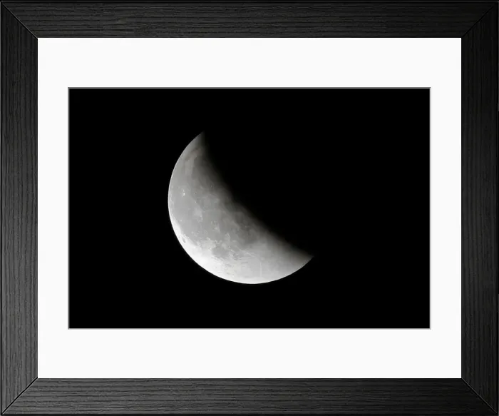 Framed Print : The super blue moon is seen during a total lunar eclipse in Beijing