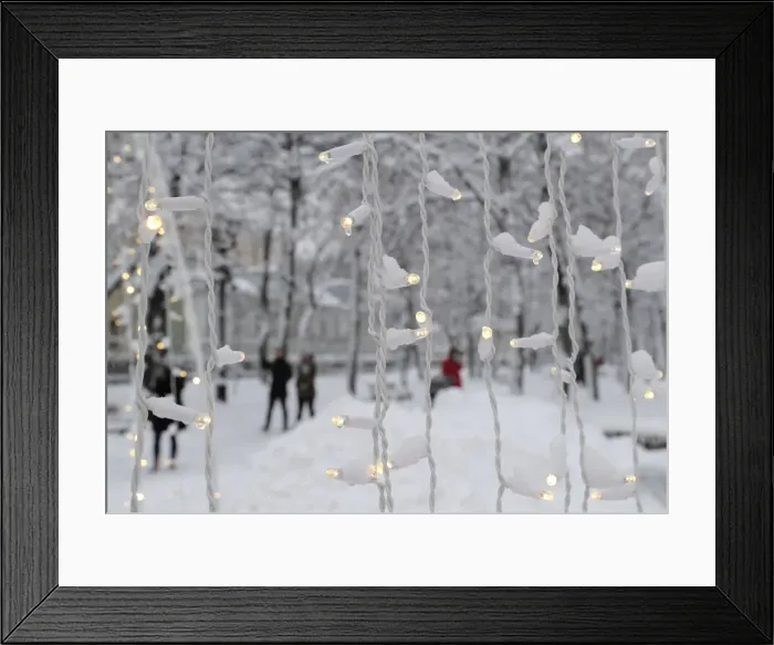 Framed Print : People walk in a boulevard after a heavy snowfall in Moscow Framed Print : People walk in a boulevard after a heavy snowfall in Moscow