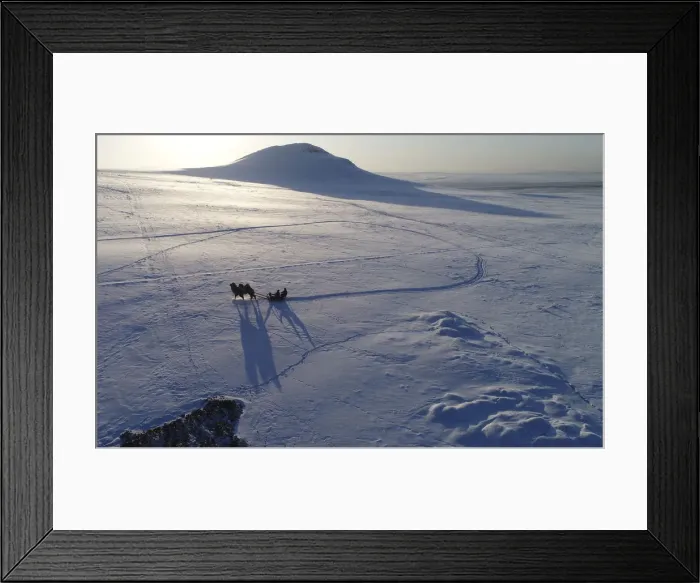 Framed Print : Tuvan shepherds travel in the snow-covered steppe near Kyzyl town in the Republic of Tuva