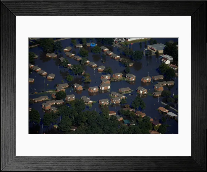Framed Print : An aerial view shows a neighborhood that was flooded after Hurricane Matthew in Lumberton Framed Print : An aerial view shows a neighborhood that was flooded after Hurricane Matthew in Lumberton
