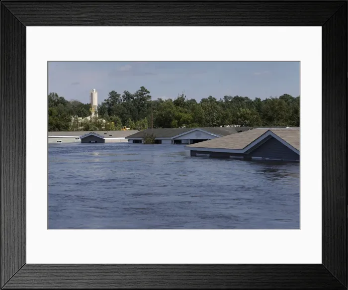 Framed Print : Submerged houses are seen by flood waters from Tropical Storm Harvey in Rose City Framed Print : Submerged houses are seen by flood waters from Tropical Storm Harvey in Rose City