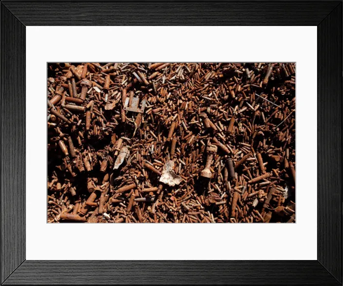 Framed Print : A pile of recyclable bullet casings used for the production of copper wires is seen at a Framed Print : A pile of recyclable bullet casings used for the production of copper wires is seen at a