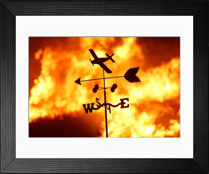Framed Print : A weather vane is pictured on a ranch during the Creek Fire in the San Fernando Valley
