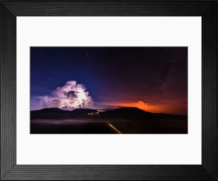 Framed Print : A long time exposure shows molten lava which flows from the Piton de la Fournaise Framed Print : A long time exposure shows molten lava which flows from the Piton de la Fournaise