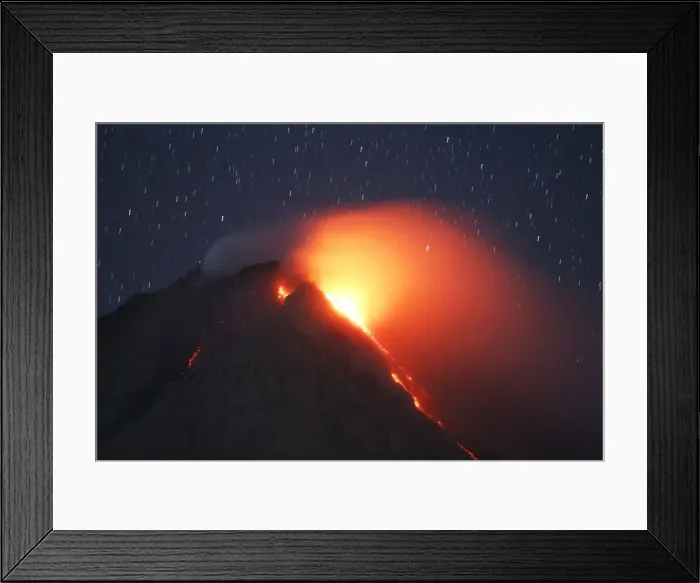 Framed Print : Lava flows from Mount Sinabung volcano during an eruption as seen from Tiga Serangkai Framed Print : Lava flows from Mount Sinabung volcano during an eruption as seen from Tiga Serangkai