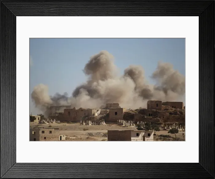 Framed Print : Smoke rises behind the ancient castle of the rebel-controlled town of Maaret al-Numan Framed Print : Smoke rises behind the ancient castle of the rebel-controlled town of Maaret al-Numan