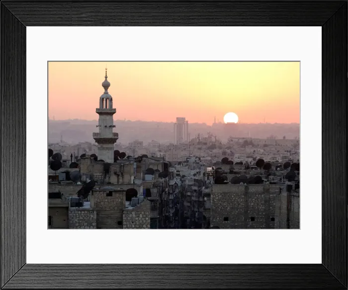 Framed Print : The sun sets over Aleppo as seen from rebel-held part of the city Framed Print : The sun sets over Aleppo as seen from rebel-held part of the city