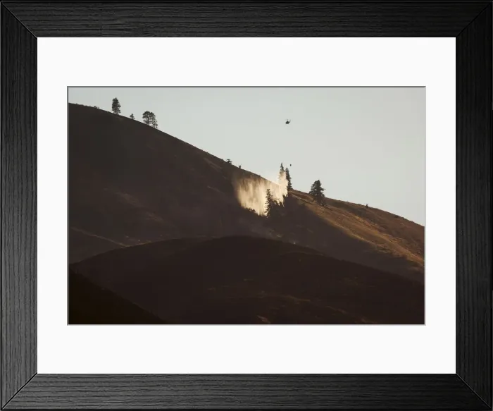 Framed Print : A helicopter drops water onto flames from the Sleepy Hollow fire in Wenatchee, Washington