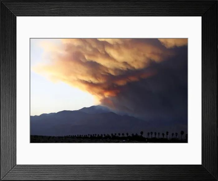 Framed Print : A smoke plume from the Lake Fire in the San Bernardino National Forest is seen at sunset