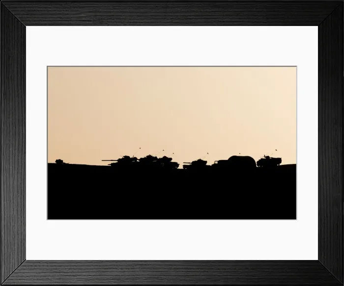 Framed Print : Turkish military are silhouetted on the top of a hill close to the border line between Framed Print : Turkish military are silhouetted on the top of a hill close to the border line between