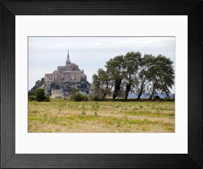 Framed Print : Le Mont Saint Michel is seen in a general view in the French western region of Normandy Framed Print : Le Mont Saint Michel is seen in a general view in the French western region of Normandy