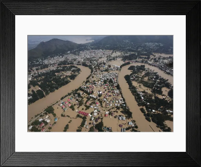 Framed Print : An aerial view taken from an Indian Air Force helicopter shows the flooded Srinagar city Framed Print : An aerial view taken from an Indian Air Force helicopter shows the flooded Srinagar city