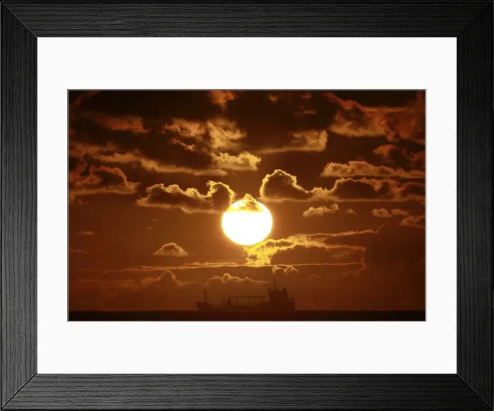 Framed Print : A ship crosses Coogee beach bay in Sydney at sunrise Framed Print : A ship crosses Coogee beach bay in Sydney at sunrise