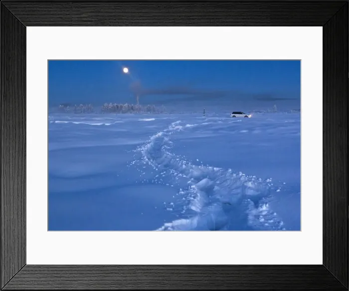 Framed Print : A car drives through the snow at night near Vostochnaya meteorological station Framed Print : A car drives through the snow at night near Vostochnaya meteorological station