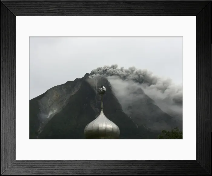 Framed Print : Mount Sinabung spews ash and hot lava as it erupts near a mosque in Karo district Framed Print : Mount Sinabung spews ash and hot lava as it erupts near a mosque in Karo district