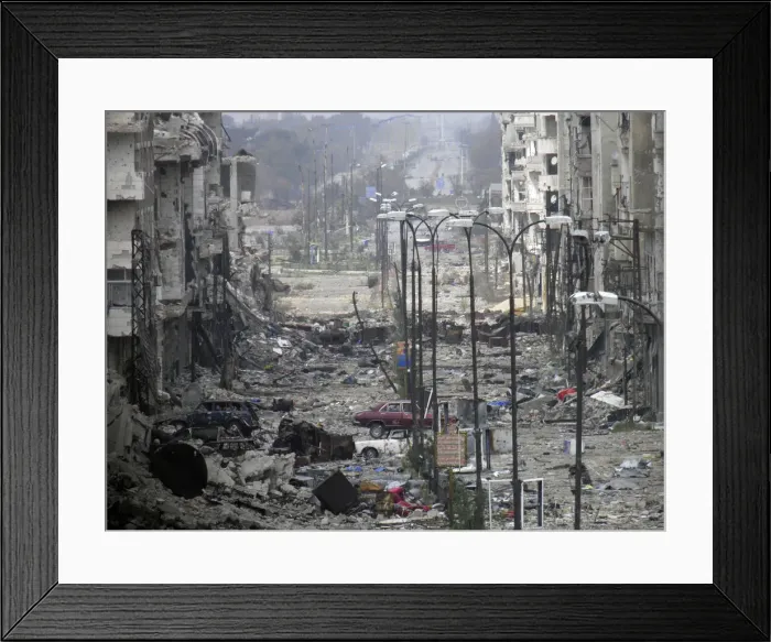 Framed Print : A general view of a deserted and damaged street filled with debris in Homs Framed Print : A general view of a deserted and damaged street filled with debris in Homs