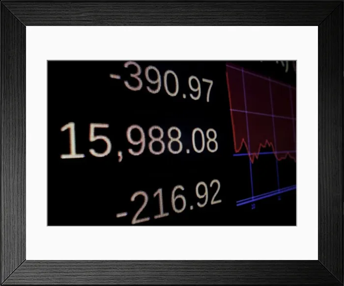 Framed Print : A screen displays the Dow Jones Industrial Average after the closing bell on the floor of Framed Print : A screen displays the Dow Jones Industrial Average after the closing bell on the floor of