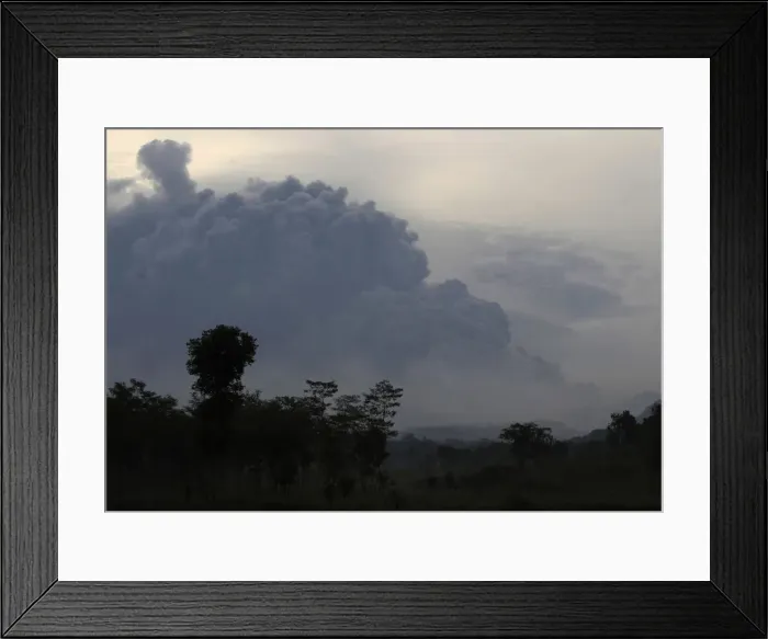 Framed Print : Ash raises from Mount Keluds eruption, as seen from Sugih Waras village Framed Print : Ash raises from Mount Keluds eruption, as seen from Sugih Waras village
