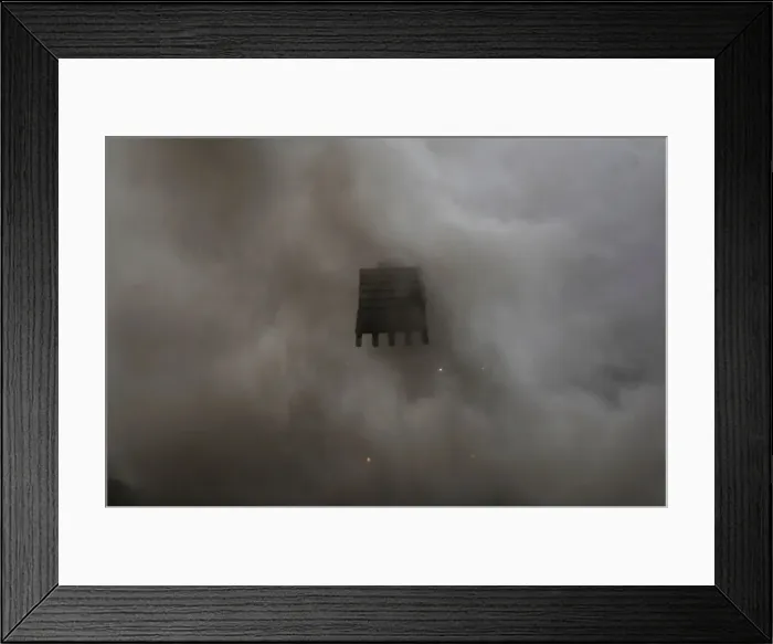 Framed Print : An excavator removes debris in an area affected by the eruption of the Fuego volcano Framed Print : An excavator removes debris in an area affected by the eruption of the Fuego volcano