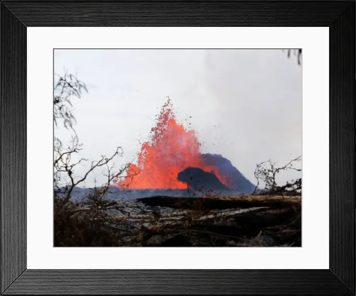 Framed Print : A volcanic fissure spurts molten rock into the air near Nohea Street