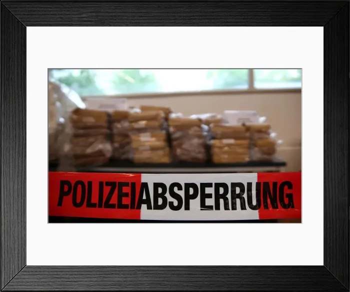 Framed Print : Seized cocaine is shown during a news conference in Munich