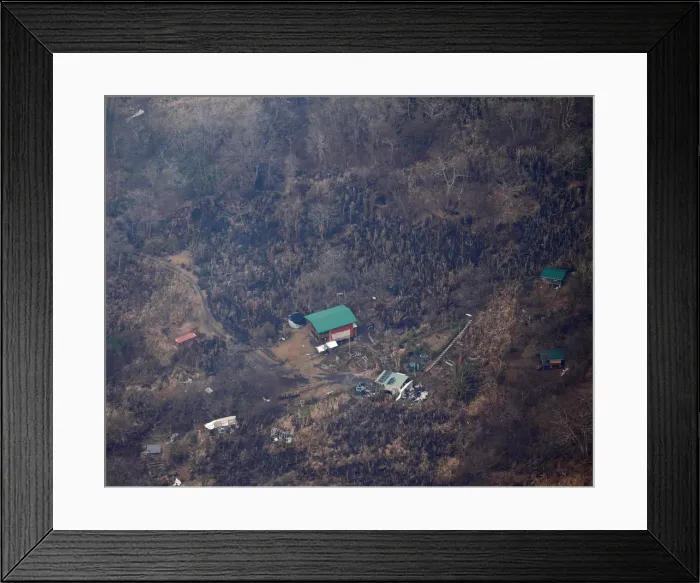 Framed Print : Several structures sit inside the Leilani Estates near Pahoa, Hawaii Framed Print : Several structures sit inside the Leilani Estates near Pahoa, Hawaii