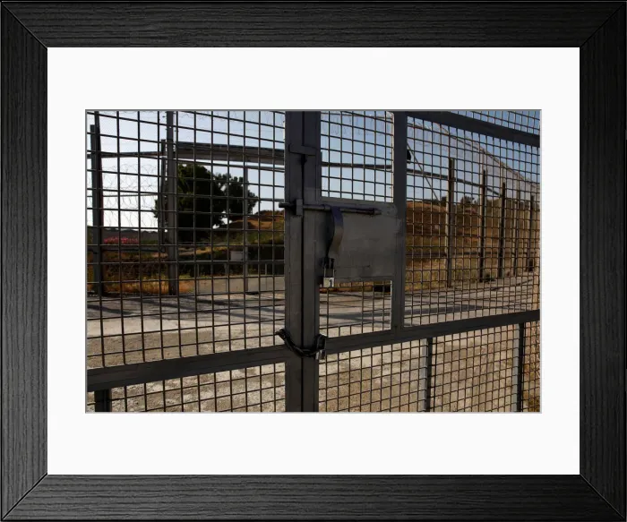Framed Print : The border fence separating Spains northern enclave Ceuta and Morocco is seen from Ceuta Framed Print : The border fence separating Spains northern enclave Ceuta and Morocco is seen from Ceuta