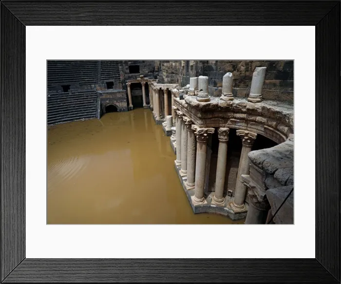 Framed Print : The 2nd century Roman amphitheatre is flooded following heavy rain in the historic Framed Print : The 2nd century Roman amphitheatre is flooded following heavy rain in the historic