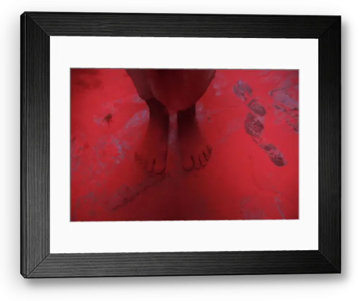 Framed Print : The feet of a man covered in red coloured powder are pictured during Holi celebrations in Framed Print : The feet of a man covered in red coloured powder are pictured during Holi celebrations in