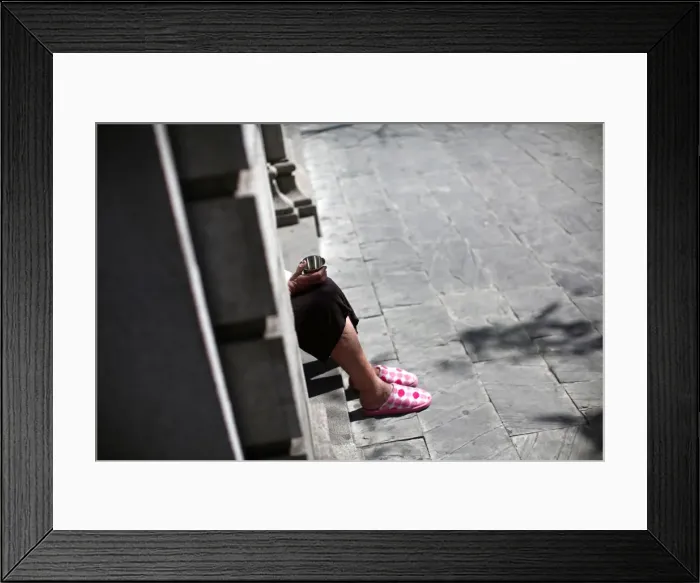 Framed Print : A woman asks for alms in Seville Framed Print : A woman asks for alms in Seville