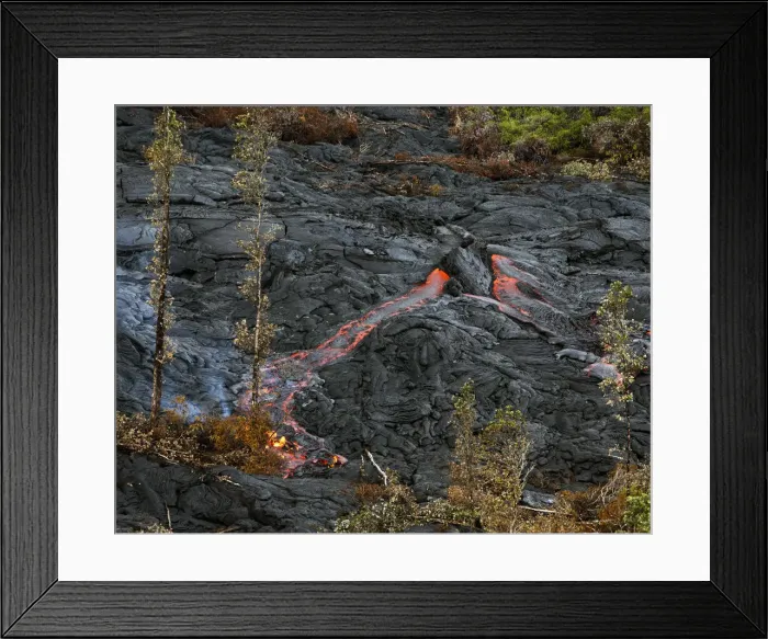 Framed Print : Lava spouts from a hot spot as the lava flow from Mt. Kilauea inches closer to Framed Print : Lava spouts from a hot spot as the lava flow from Mt. Kilauea inches closer to