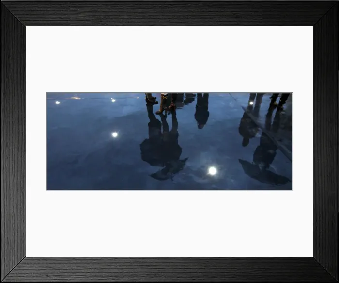 Framed Print : People are reflected on the floor illuminated with LED lights during the inauguration of Framed Print : People are reflected on the floor illuminated with LED lights during the inauguration of
