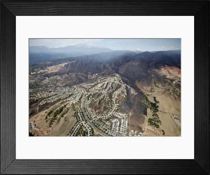 Framed Print : The burned area of hundreds of totally destroyed homes in the Waldo Canyon fire is seen