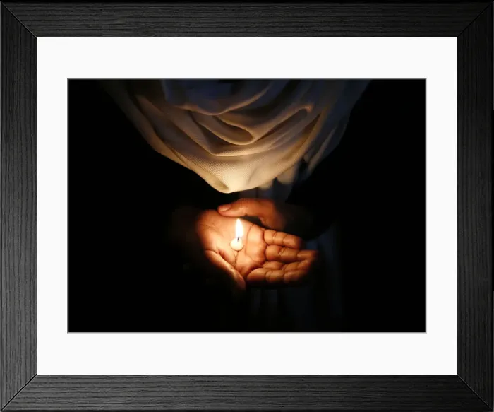 Framed Print : A Christian holds a candle during a vigil in New Delhi Framed Print : A Christian holds a candle during a vigil in New Delhi