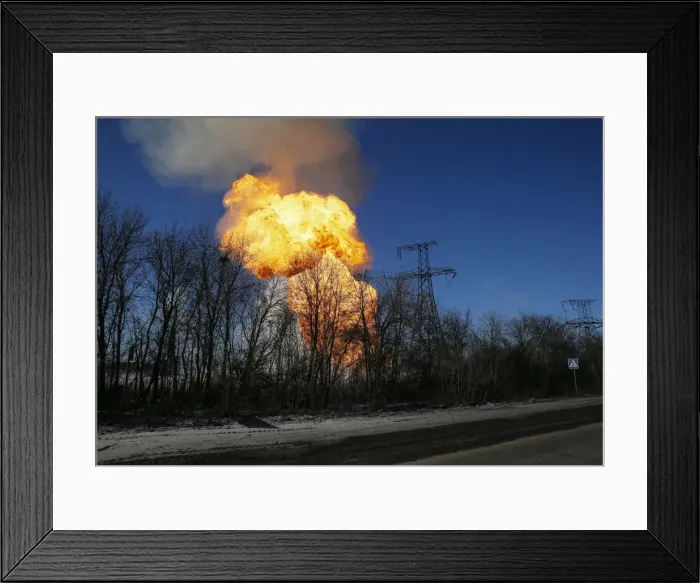 Framed Print : A view of an explosion after shelling is seen not far from Debaltseve Framed Print : A view of an explosion after shelling is seen not far from Debaltseve