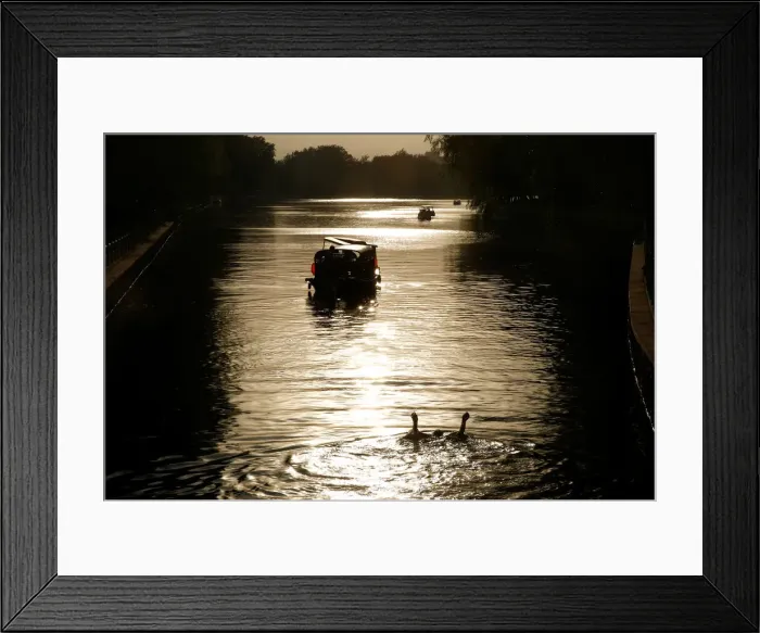 Framed Print : A man swims in Houhai lake on a hot summer day in Beijing Framed Print : A man swims in Houhai lake on a hot summer day in Beijing