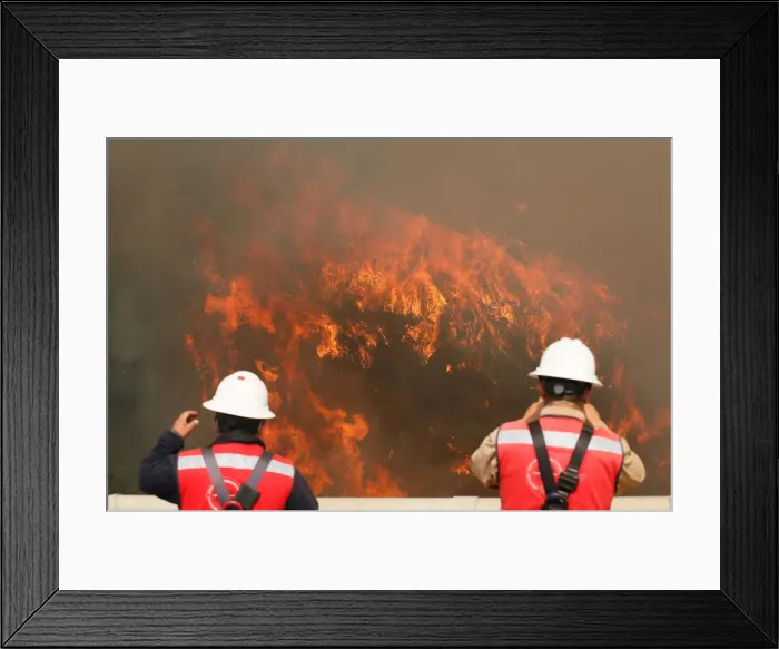 Framed Print : Fire is seen on a hill, where more than 100 homes were burned due to forest fire but Framed Print : Fire is seen on a hill, where more than 100 homes were burned due to forest fire but