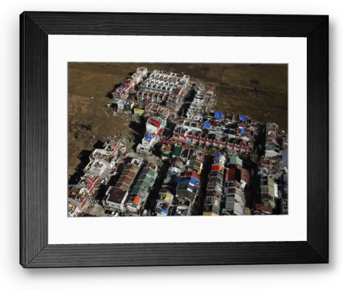 Framed Print : An aerial view shows houses damaged by Typhoon Haiyan, on the outskirts of Tacloban Framed Print : An aerial view shows houses damaged by Typhoon Haiyan, on the outskirts of Tacloban