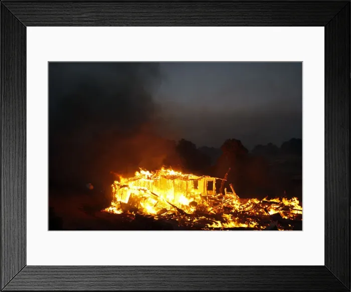 Framed Print : A house burns in the Twin Pines Road area at the Silver Fire near Banning