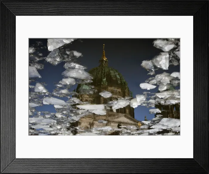 Framed Print : The Berlin Cathedral is reflected in Spree river that carries ice floats downstream Framed Print : The Berlin Cathedral is reflected in Spree river that carries ice floats downstream