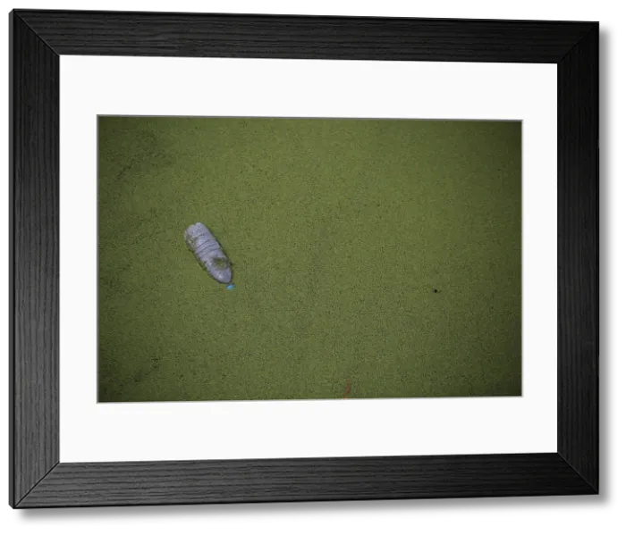 Framed Print : A polluted river is seen in Shanghai Framed Print : A polluted river is seen in Shanghai