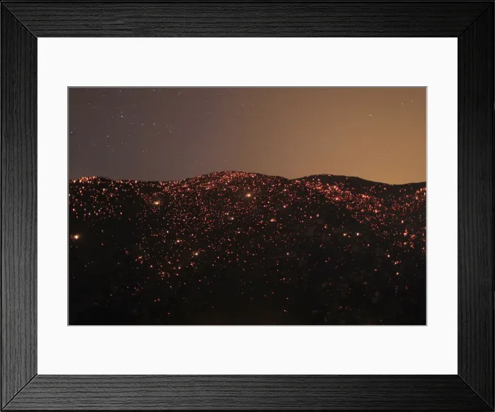 Framed Print : A smouldering mountainside is seen under the stars at the Silver Fire near Banning Framed Print : A smouldering mountainside is seen under the stars at the Silver Fire near Banning